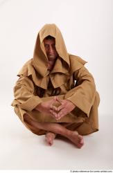 Joel Adamson Monk Sitting Pose